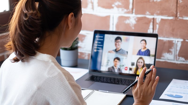 An employee working securely from home as part of a hybrid workforce